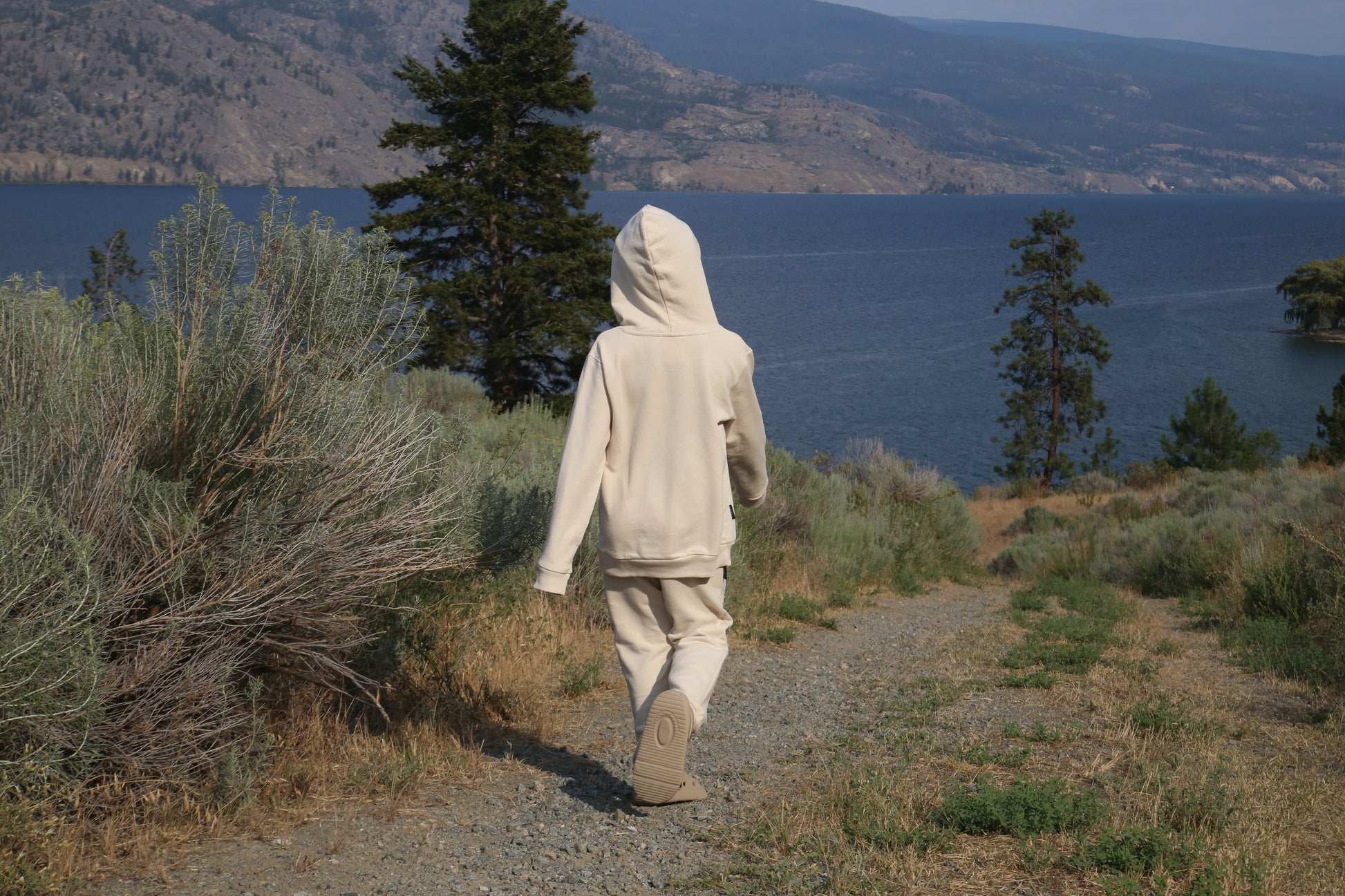 Kid playing in oat french terry hoodie by KidORCA