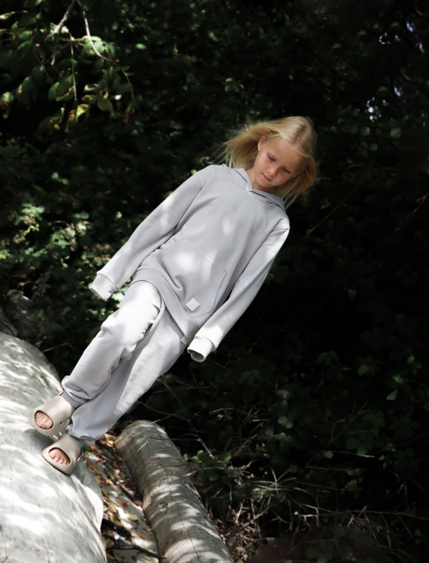 Kid playing in dove grey brushed terry hoodie by KidORCA