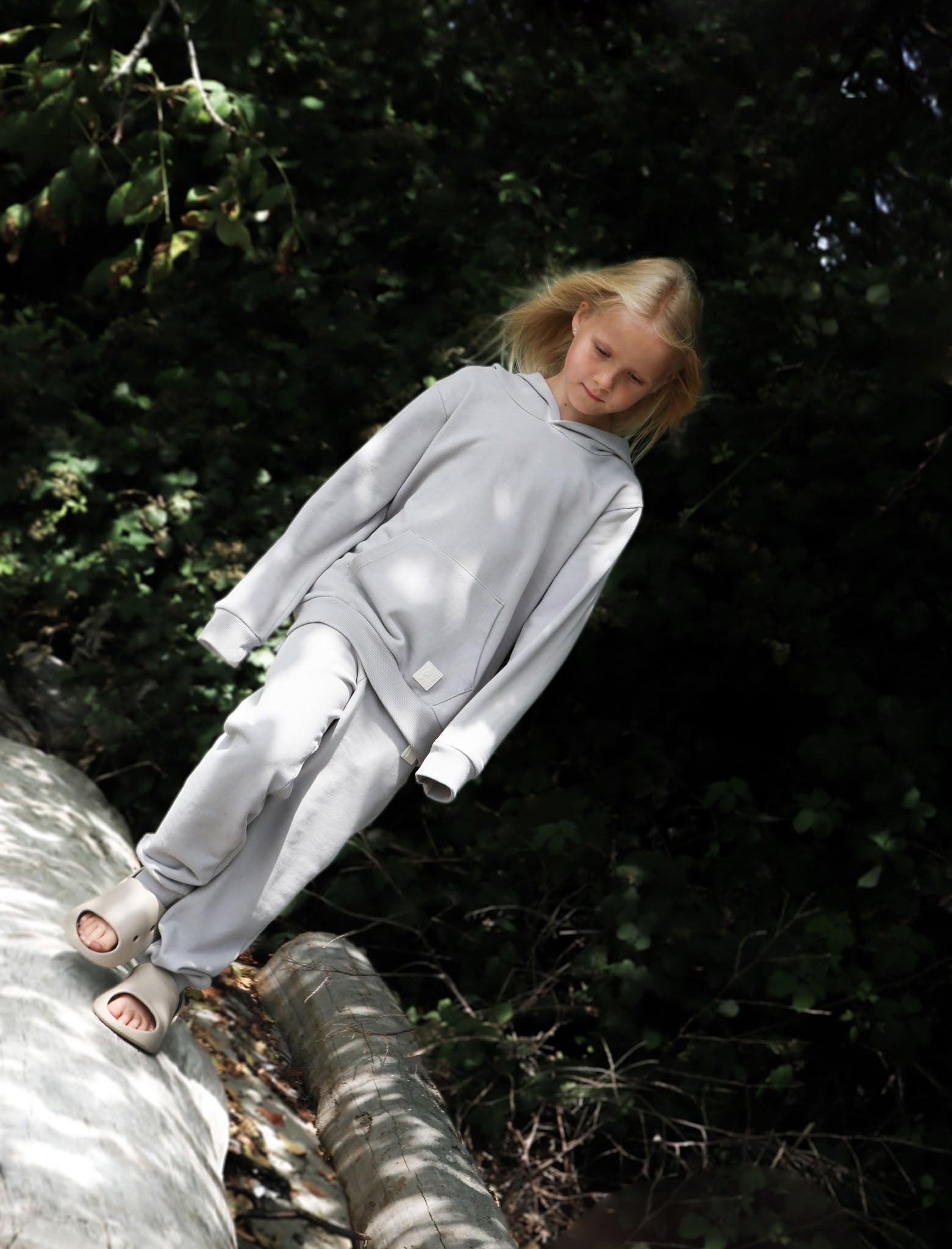 Kid playing in dove grey brushed terry hoodie by KidORCA