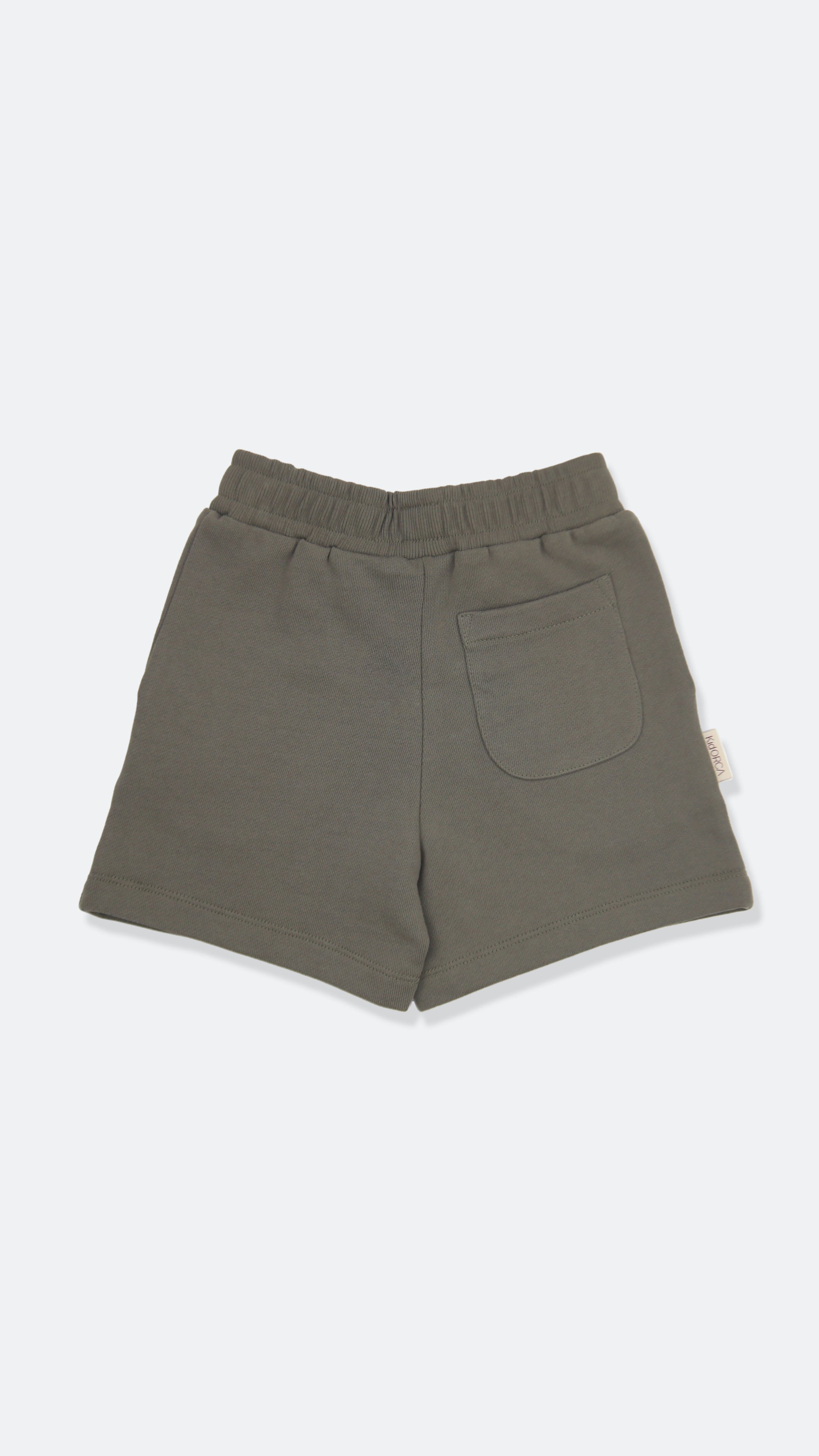 Close-up of french terry fabric and elastic waistband – dusty olive kids shorts