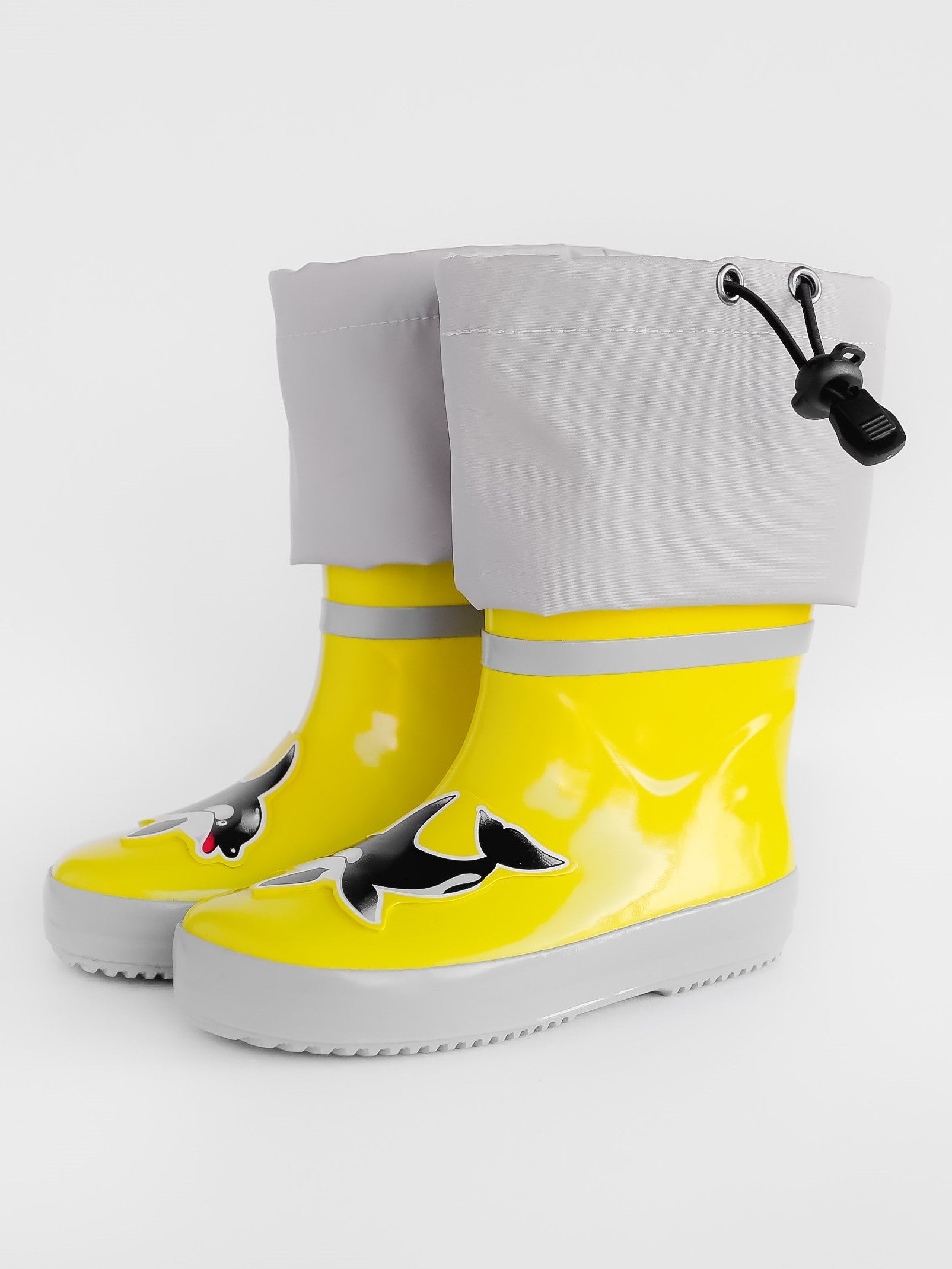 Close-up of waterproof rubber and non-slip sole – yellow rain waders