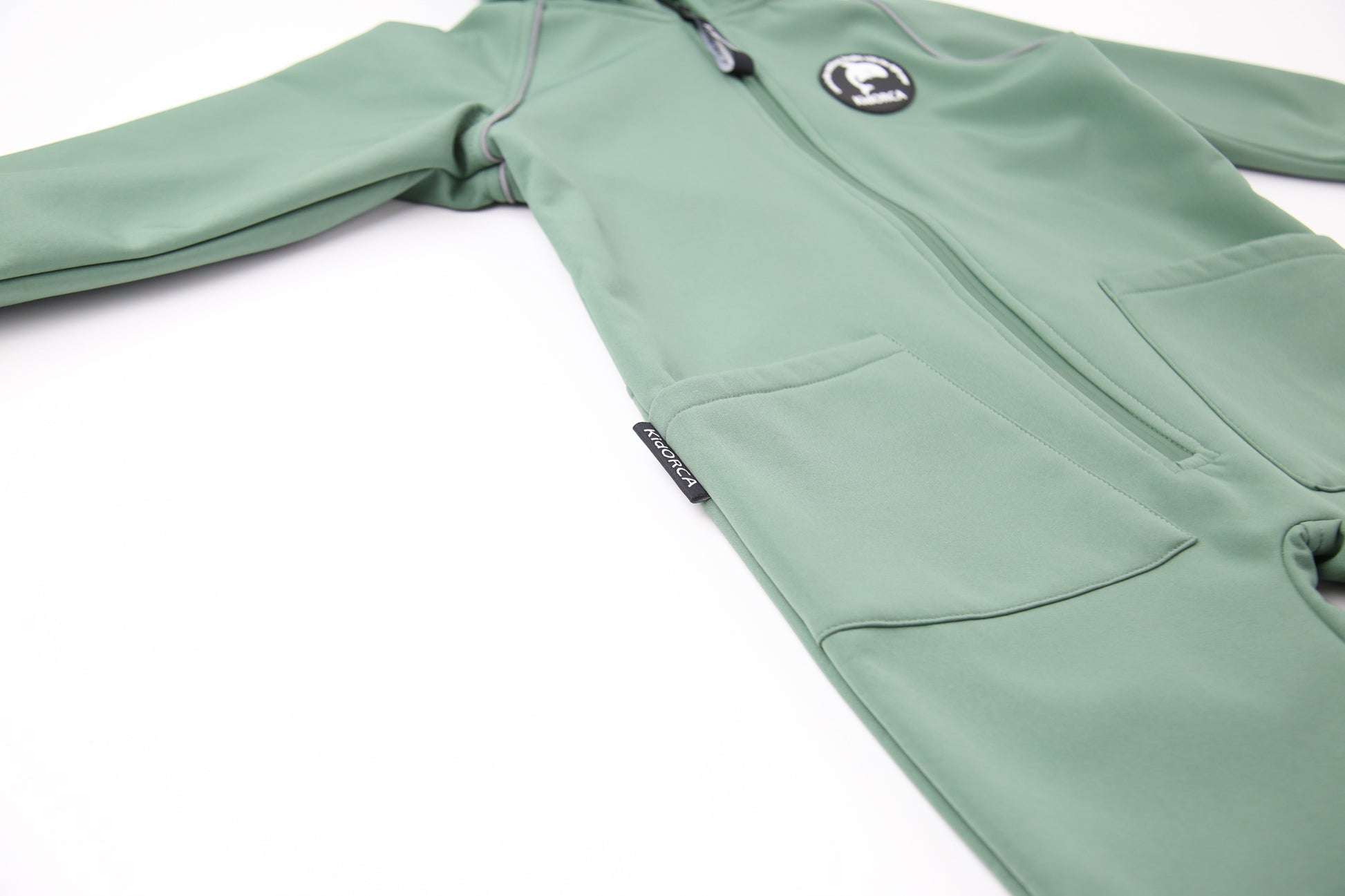 Close-up of breathable fabric – olive play suit
