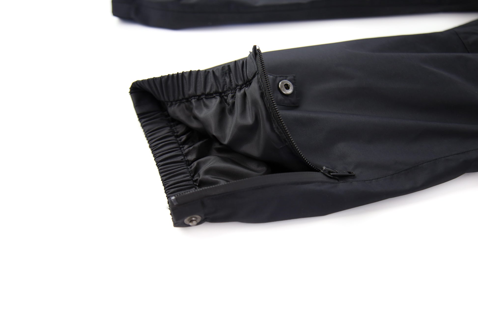 Ankle cuff detail – black insulated waterproof rain pants