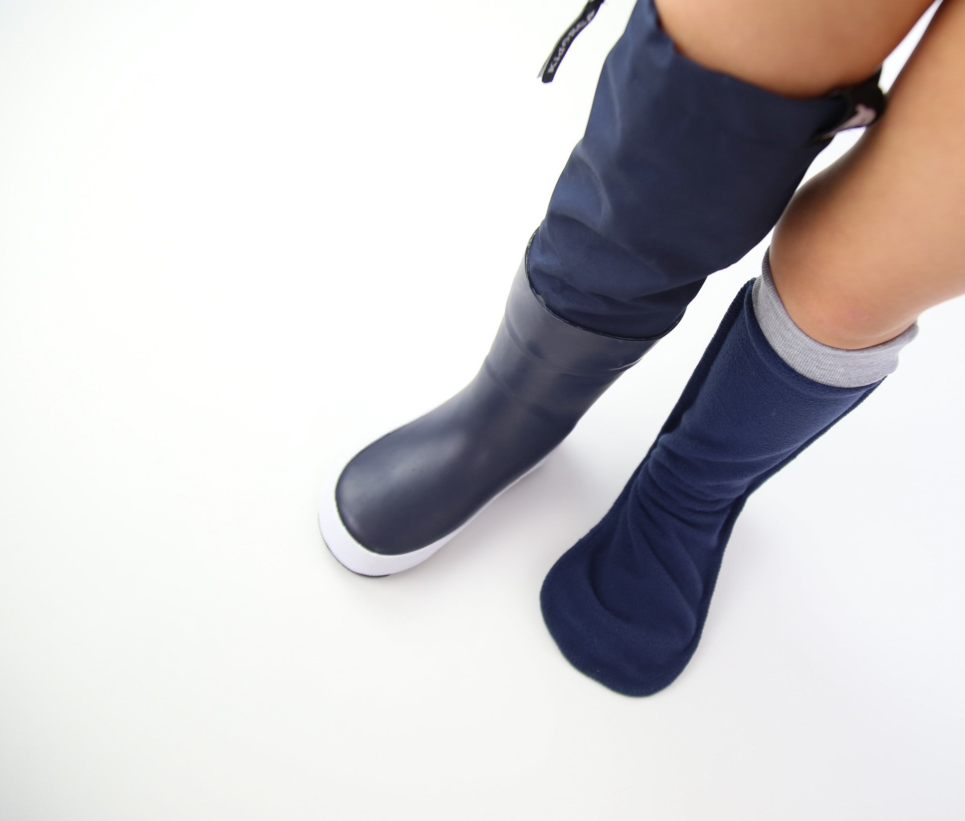 Child wearing soft fleece socks – cozy indoor feel