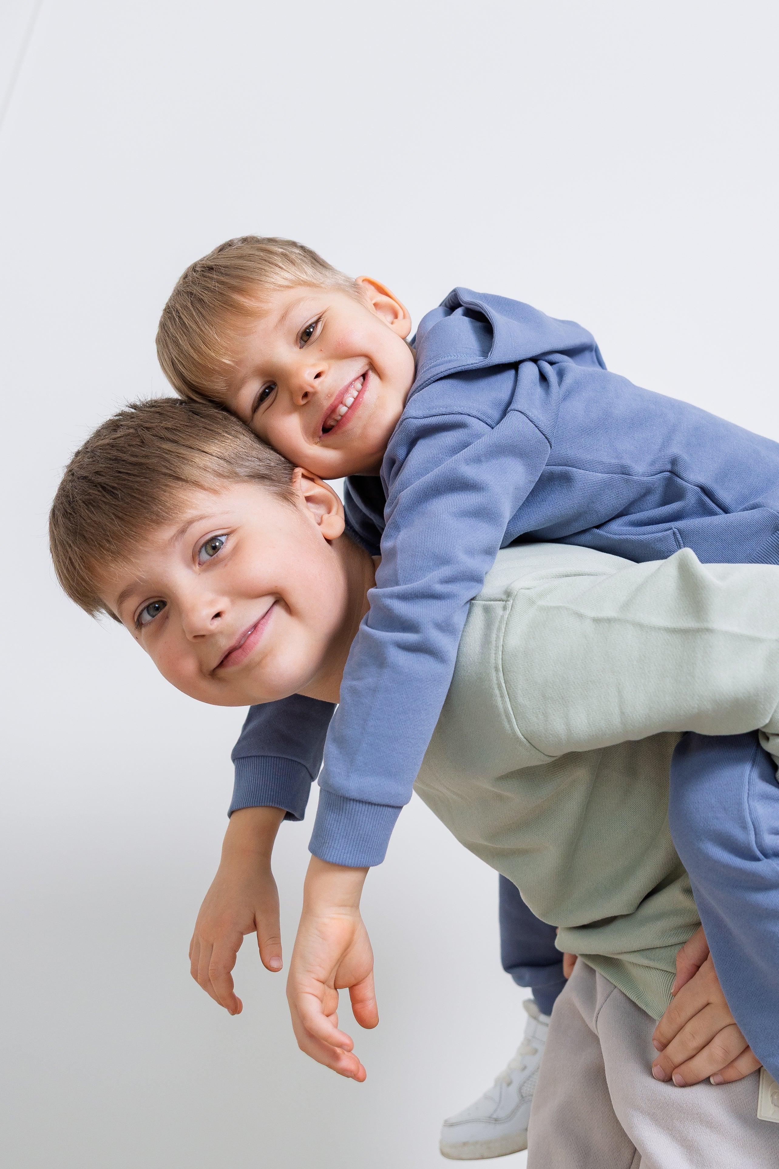 Children wearing soft loungewear from KidORCA, lounging comfortably at home