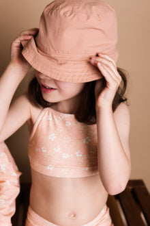 Girl playing in Evangelina Tuscany swim top by KidORCA