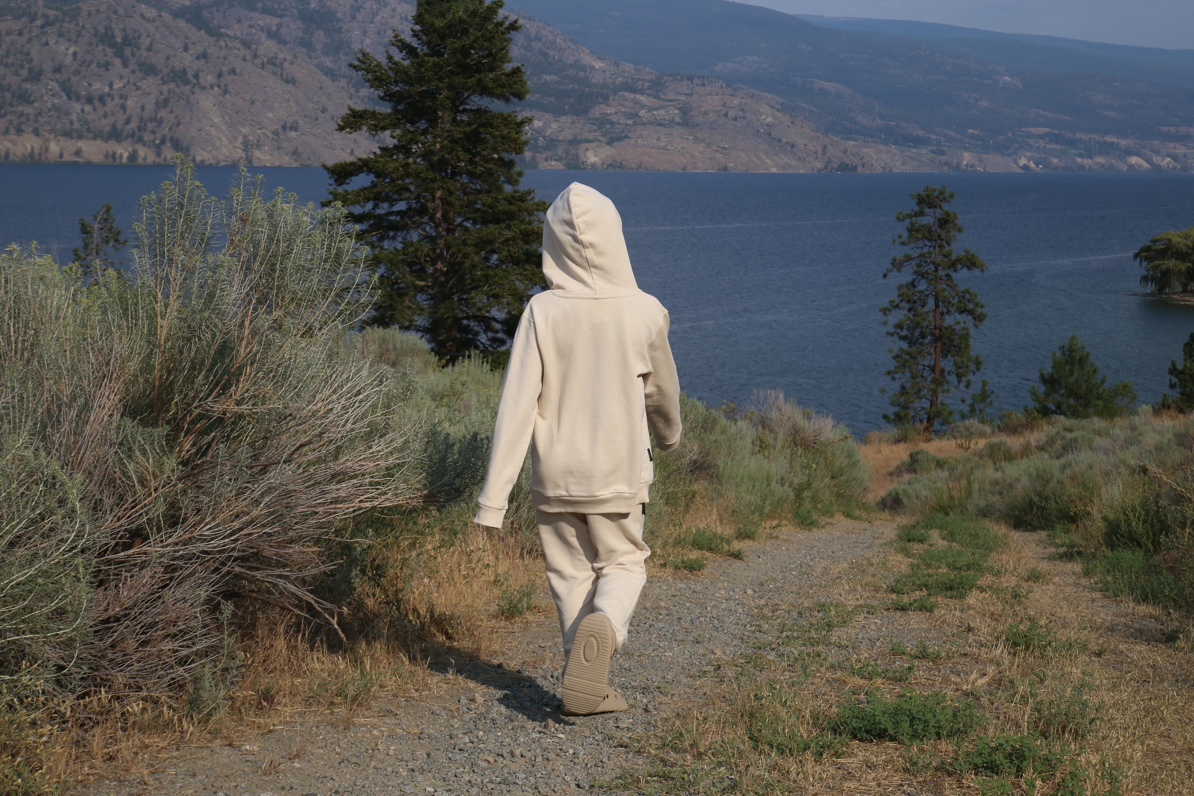 Kid playing in oat french terry hoodie by KidORCA