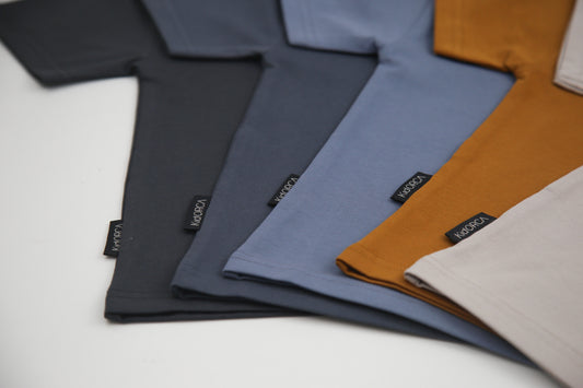 Seam and hem detail on flint gray kids tee