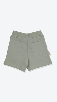 Organic french terry kids shorts in sage green – back view