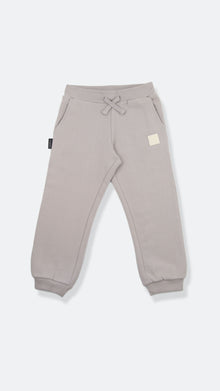 Organic brushed terry kids sweatpants in dove grey – front view