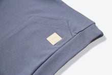Kangaroo pocket and rib cuff detail on flint french terry kids hoodie