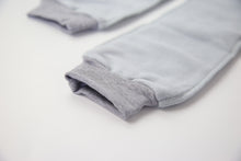 Close-up of grey fleece sock fabric texture – plush and warm